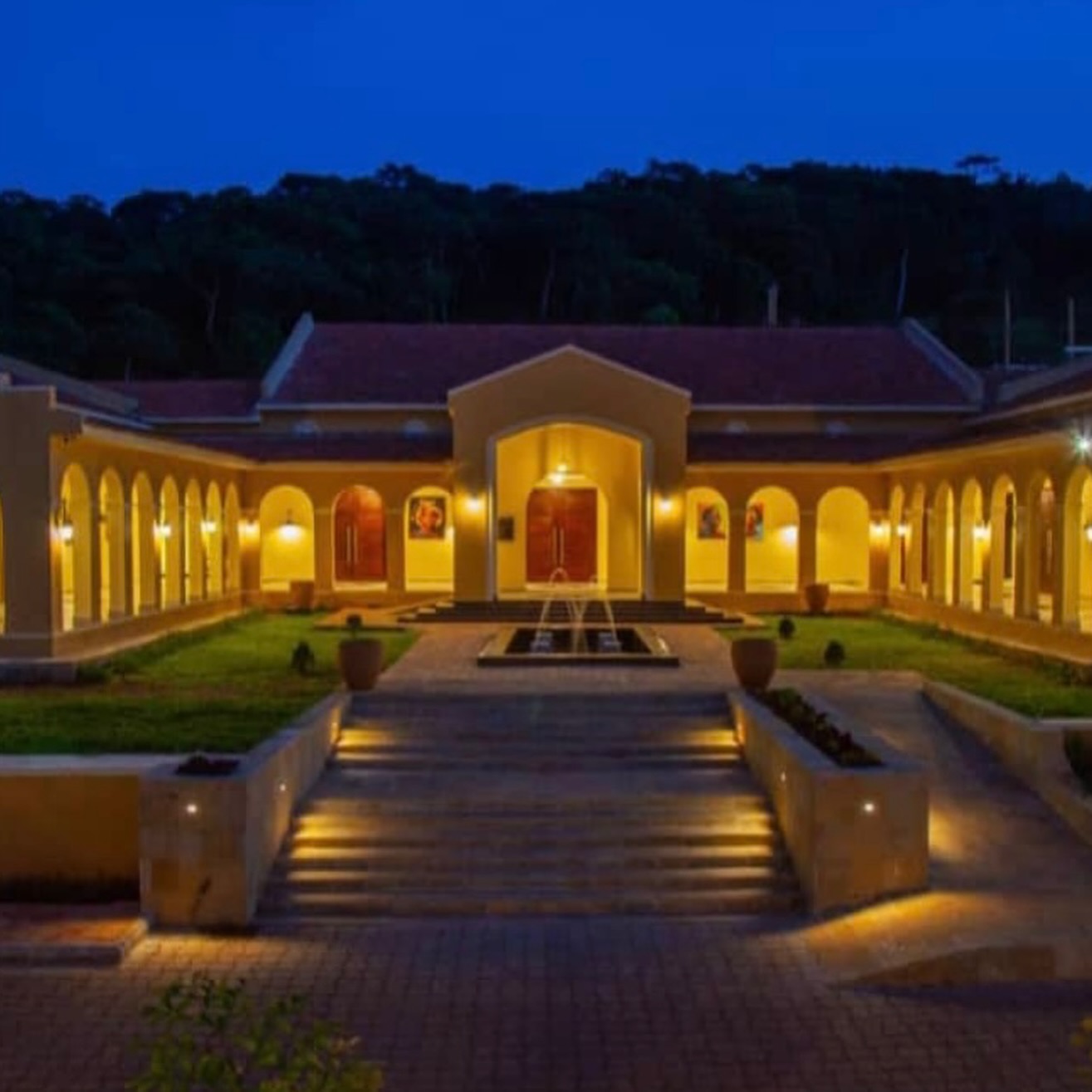 The lodge frontage lit at dusk