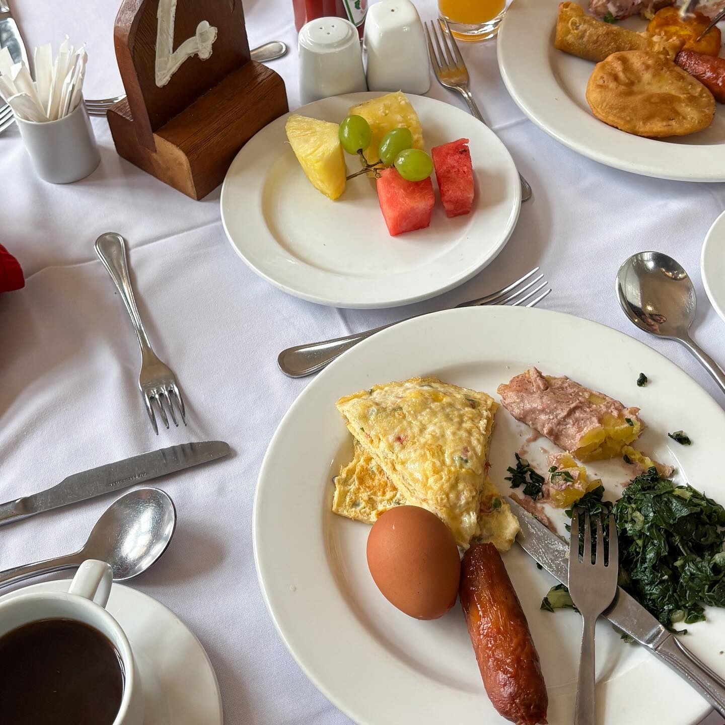 Cooked breakfast with fresh fruit